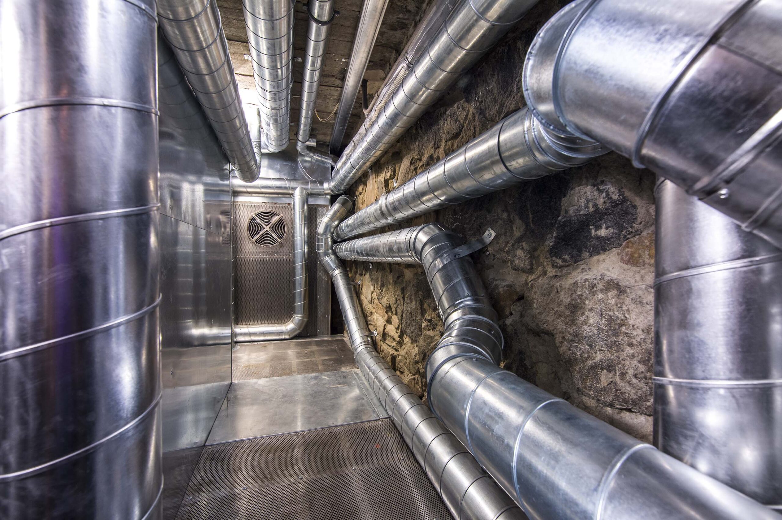 Metal duct work protected from moisture with ArmorGuard polyurea coating.