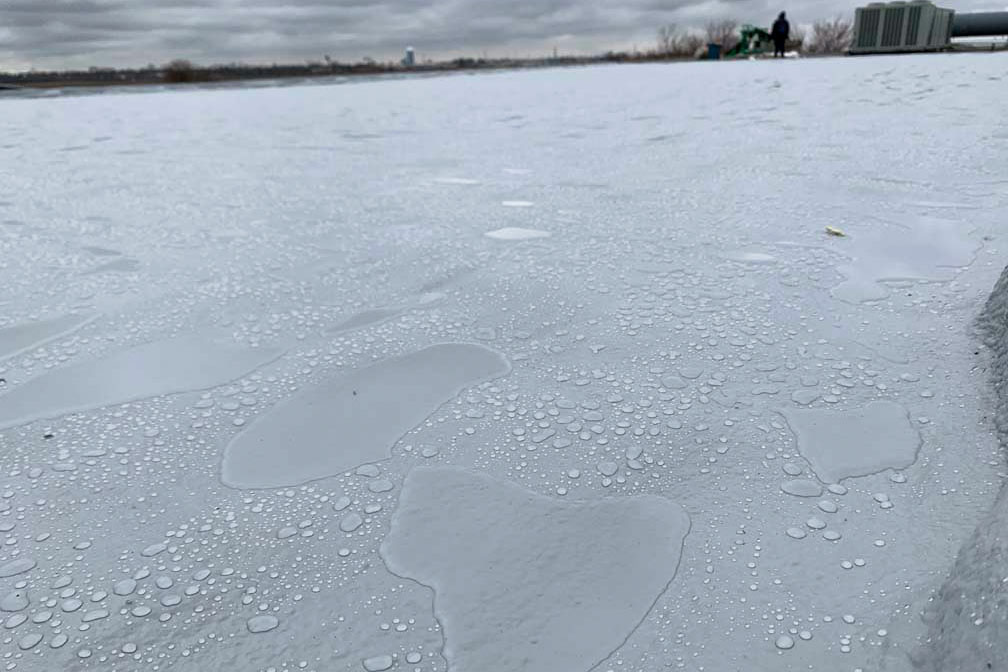 Water running off of a roof after a roof coating was applied by ArmorGuard to prevent any leaks.